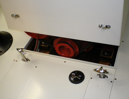 Forward closing.  Latches unsecured