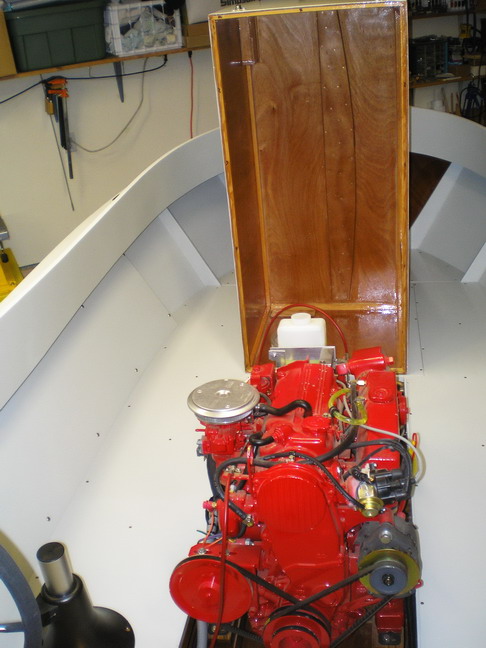 Box open and back, ready to lower and latch.