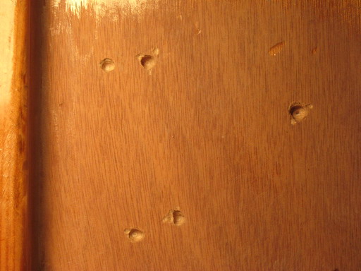 Bilge pumps initially mounted directly to hull; Dremeled holes to solid material.