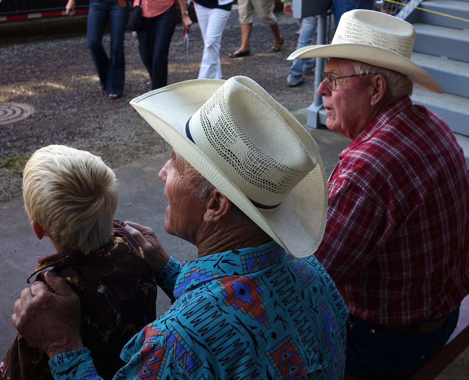 Grandfather with grandson and a friend before the rodeo.