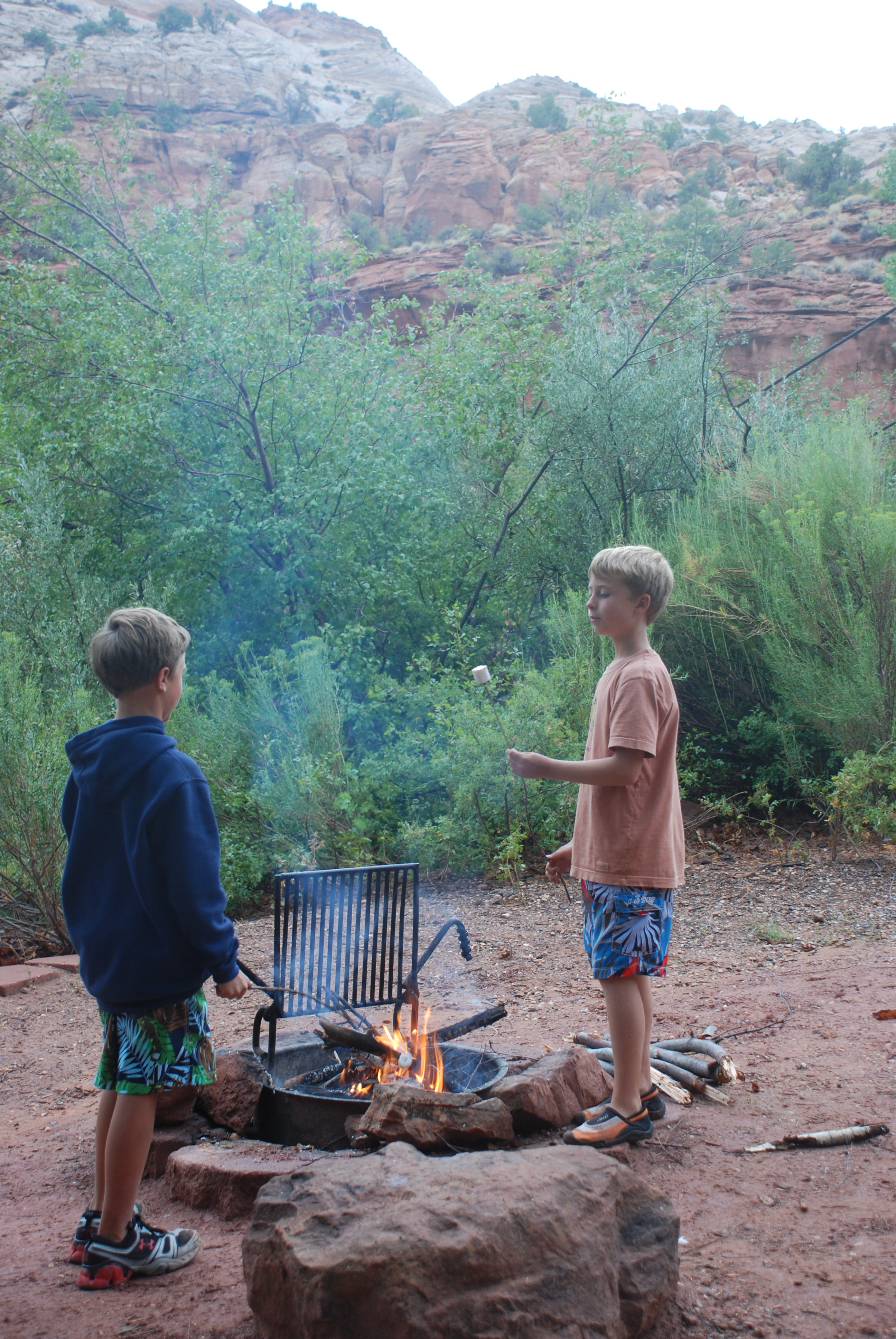 Sam and Will roasting marshmellows
