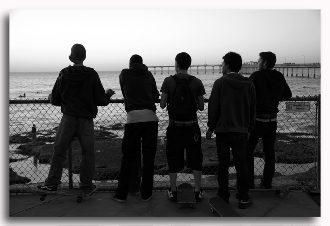 Skateboarders At Sunset