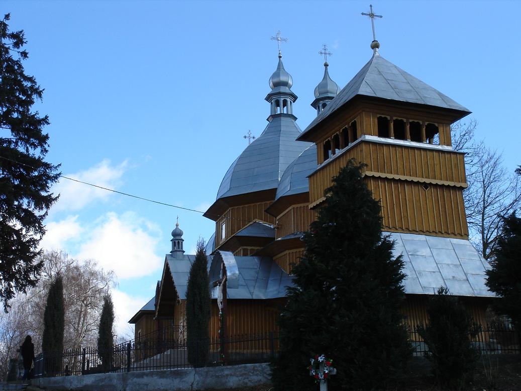 wooden St. Nicholas church, above town