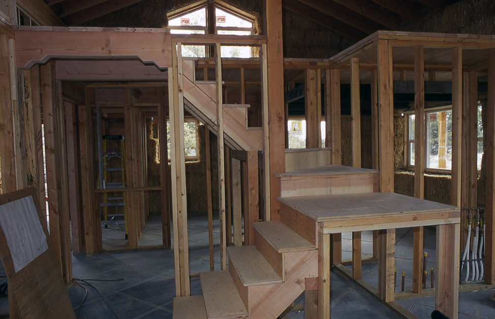 interior framing looking east, hall and stairs to loft