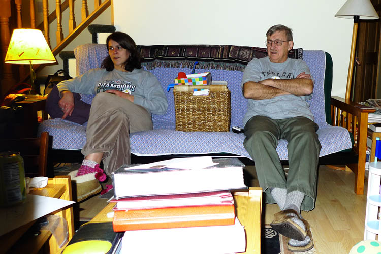 Mut and Jeff watch the game.