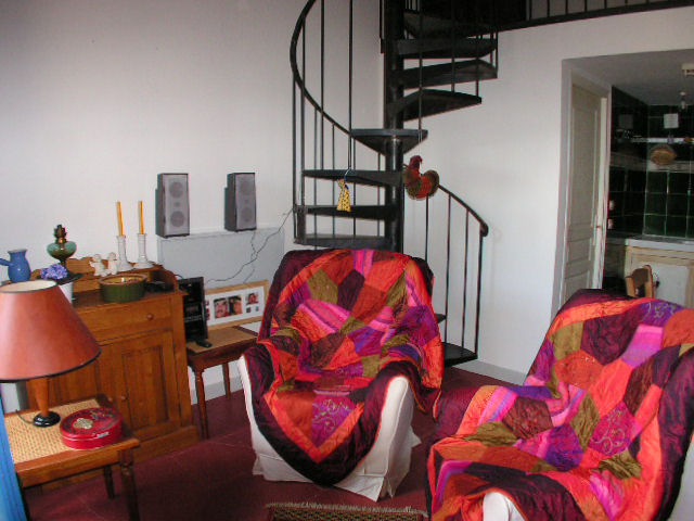 stitting area with spiral staircase