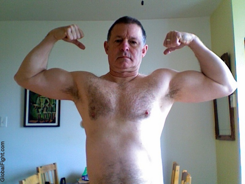 older man hot pecs biceps.jpg