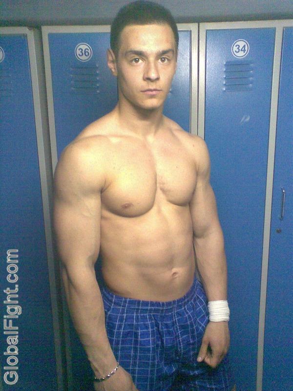 lockerroom pecs muscular man.jpeg