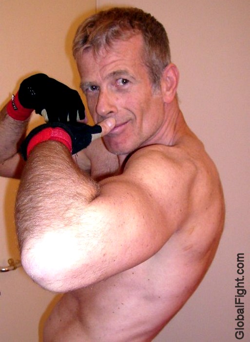 biceps handsome muscleman flexing.jpeg