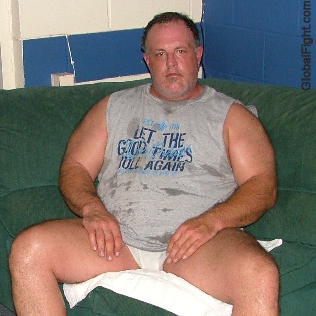 big sweaty powerlifter man lifting husky muscles.jpg