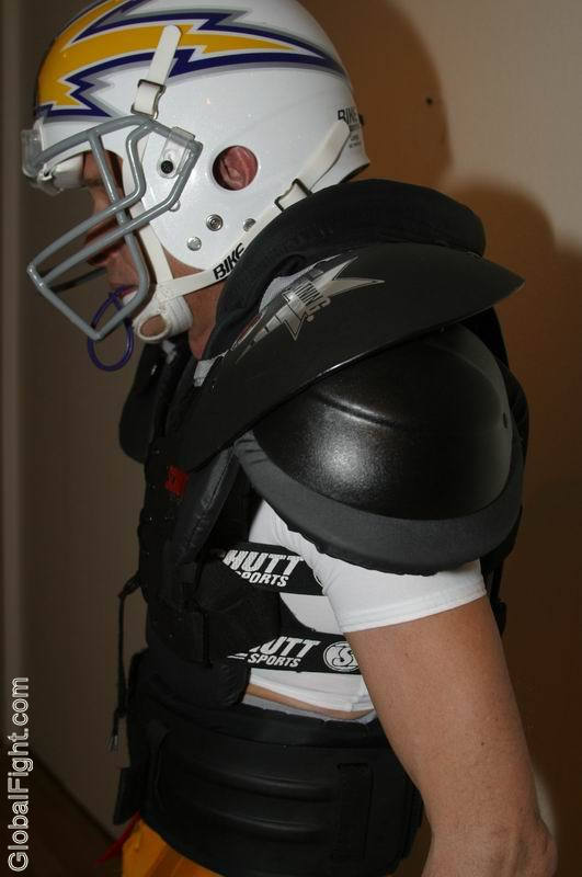 slender football player wearing gear helmet spandex.jpg