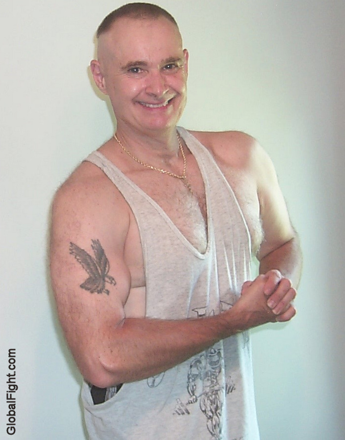 musclehunk flexing big arms biceps tattooed pictures tattoos.jpg