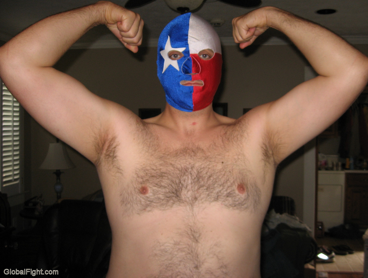 double bicep posing pro wrestler masks hairypecs pits chest.jpg