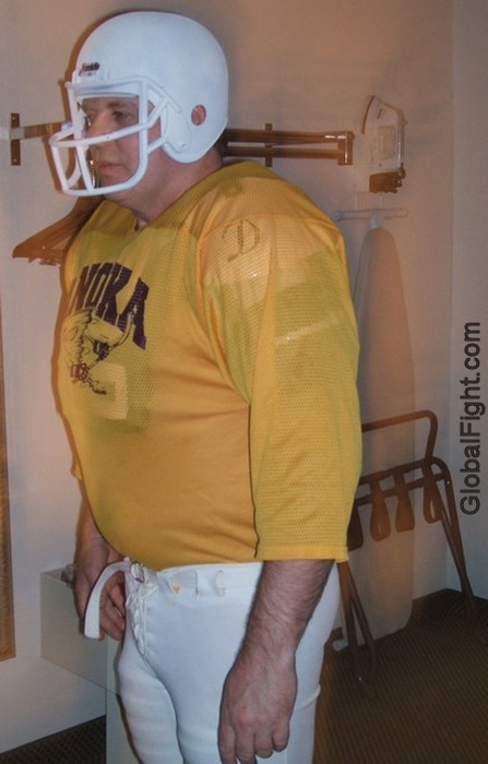 daddies wearing his college football gear pics.jpg