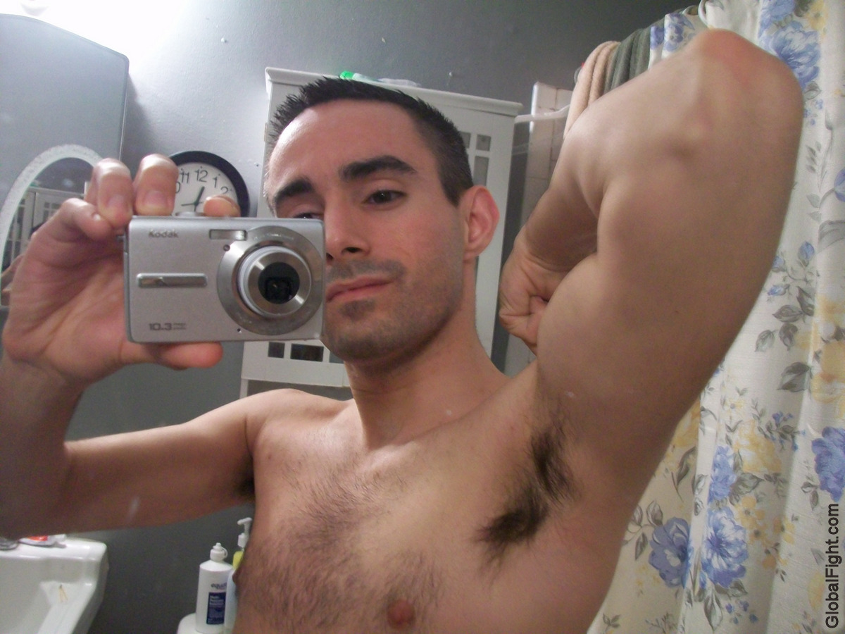 dorm room jock flexing showing armpits.jpg