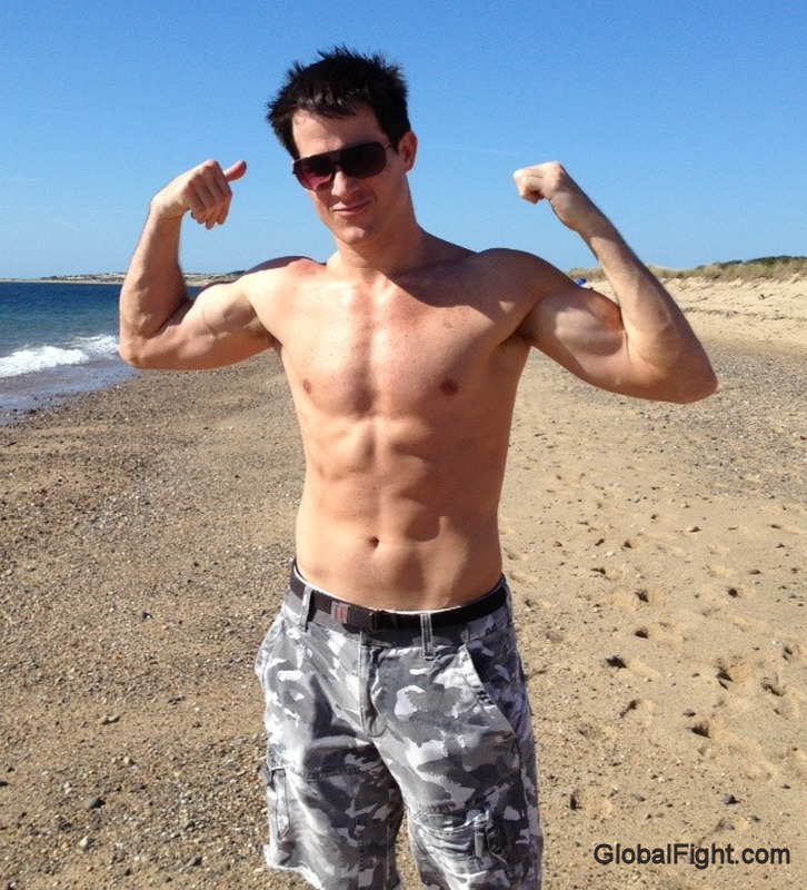 jock stud flexing beach.jpg