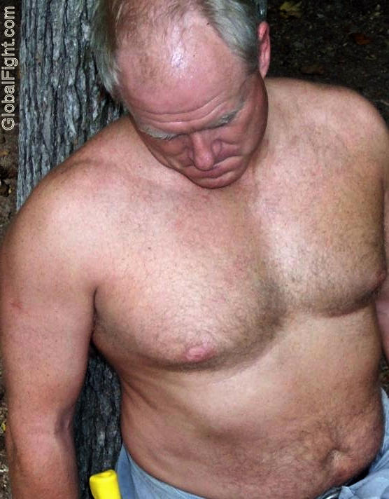 man taking break hiking woods.jpg