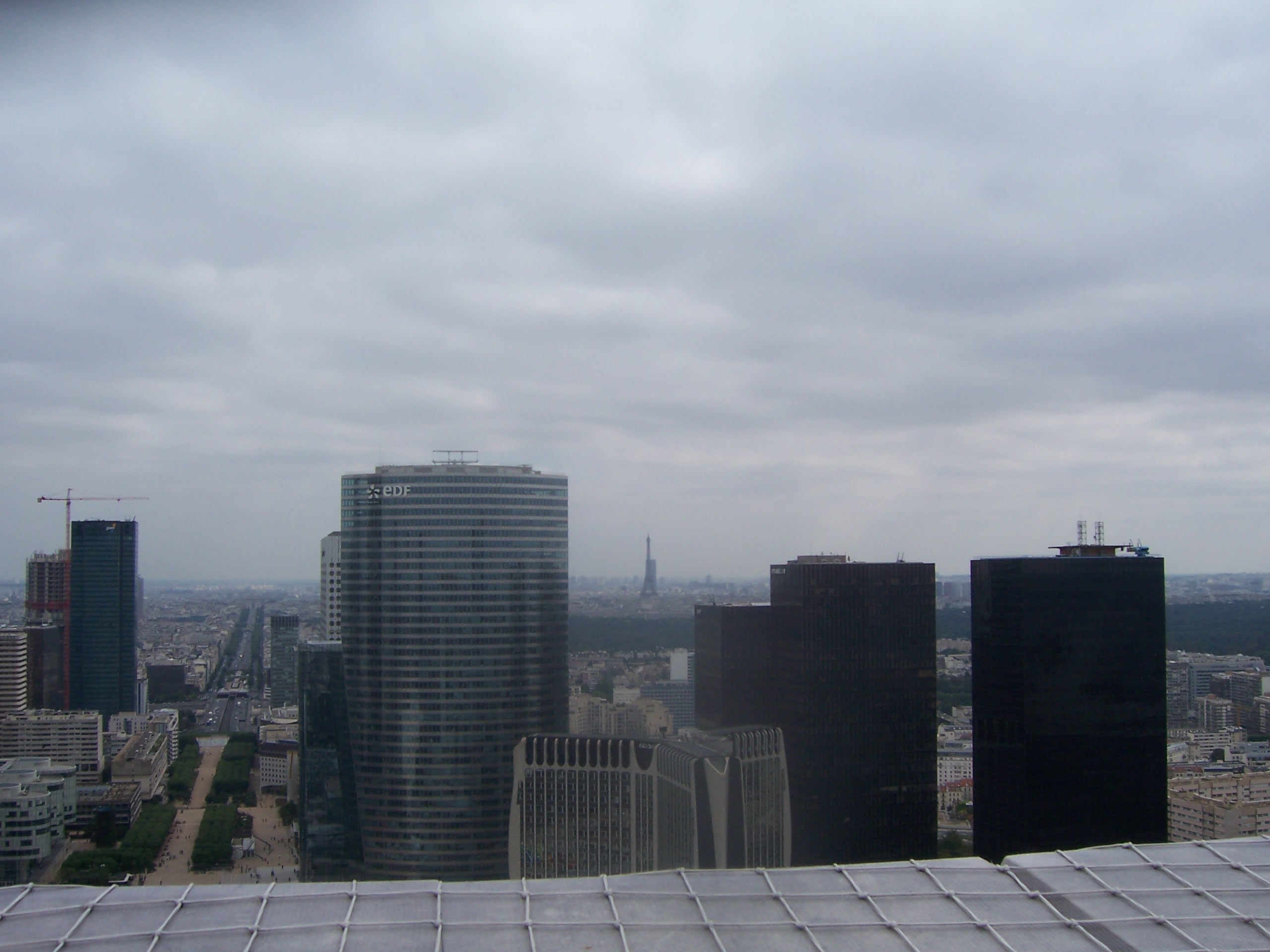 Looking from the roof of the De L Grande Arche toward the Eiffel Tower