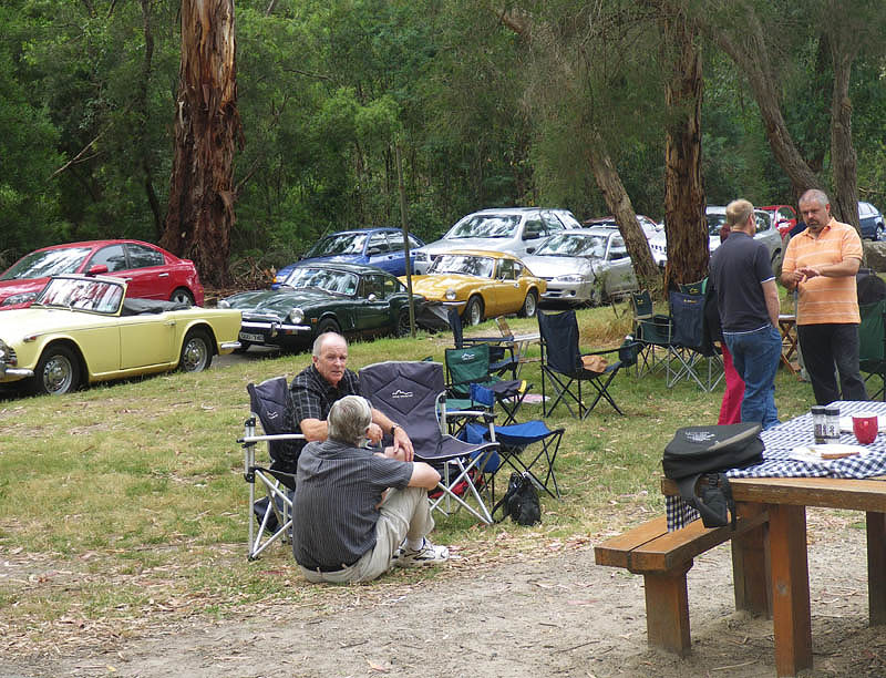 Triumph car owners picnic at the picnic grounds along the parking area