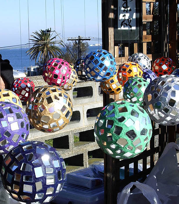 Mirrored balls for sale, Sunday street market, St Kilda Esplanade.