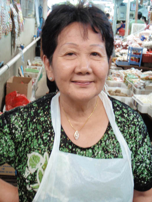 Woman shopkeeper, Malay market, 2008