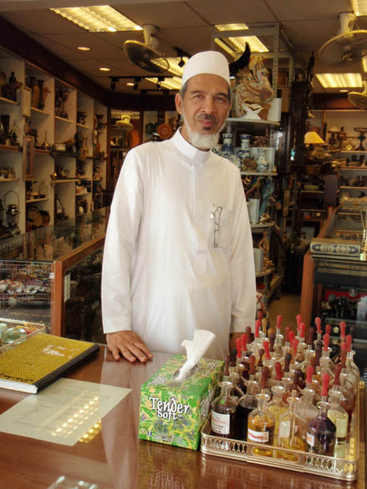 Arab shopkeeper in his perfumery, 2008