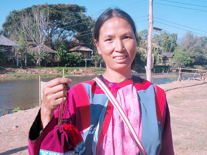 Village woman offering wares