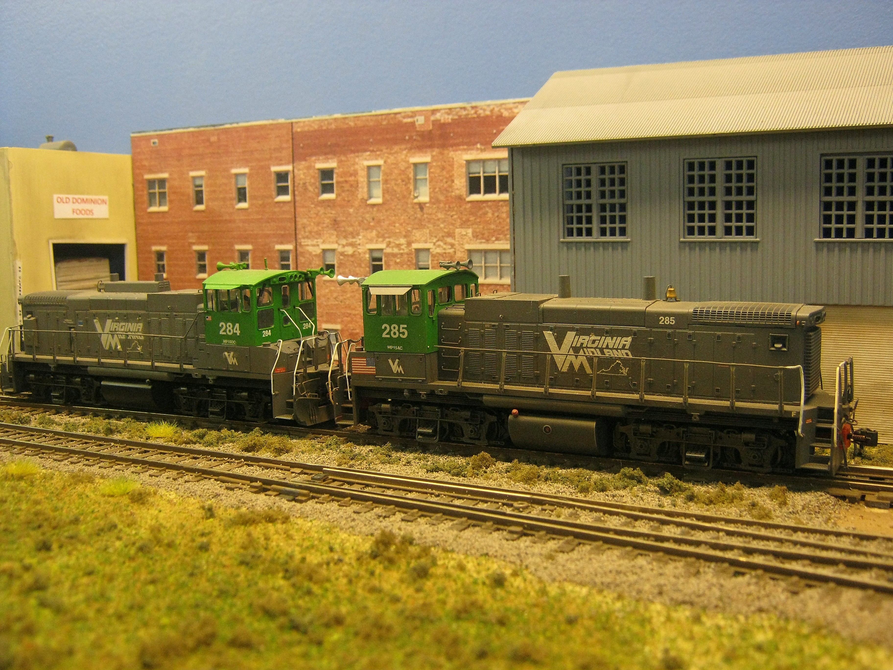 VM MP15DC 284 & 285 get ready to move a cut of cars.