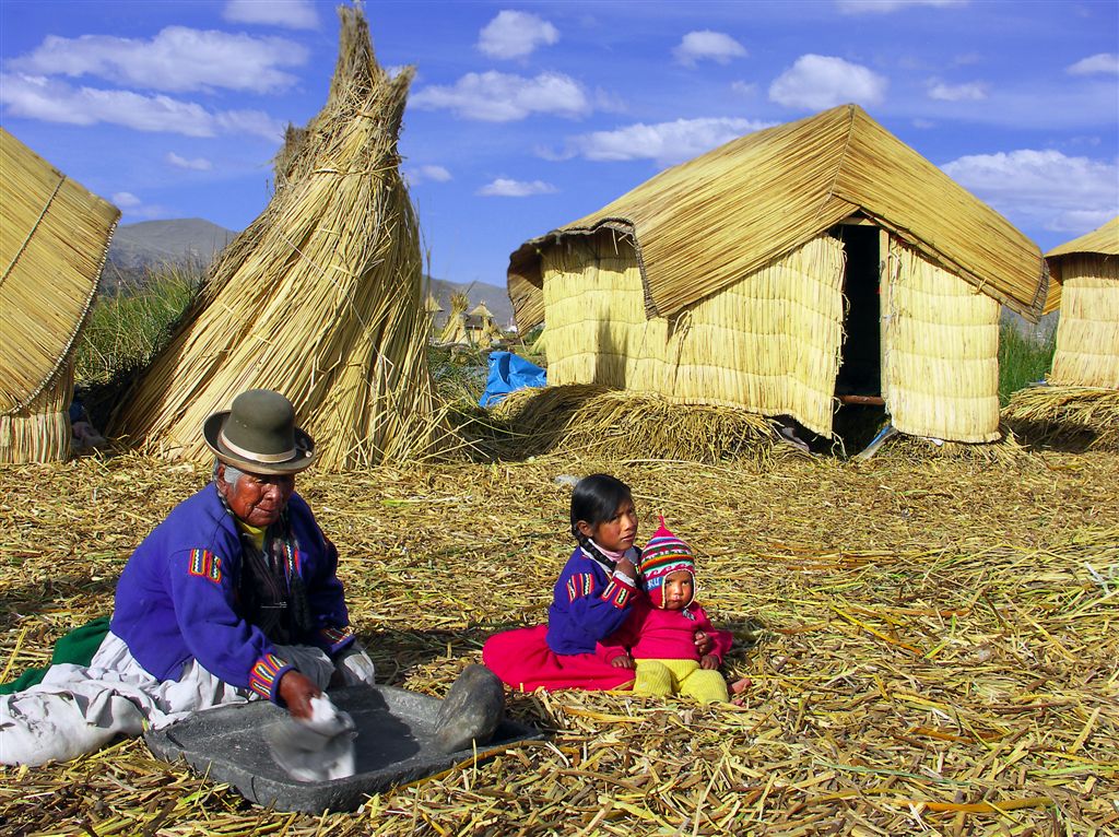 Grandma Grinds The Grains, Uros Island, Titicaca Lake