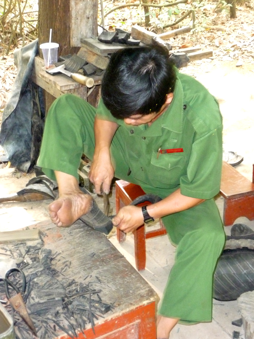 This craftsman was making sandals out of used tires.  Ho Chi Minh used to wear them.