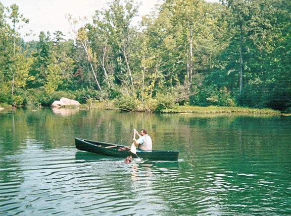 Paddling my Royalex Wenonah Adirondack with Zach Swimming.jpg