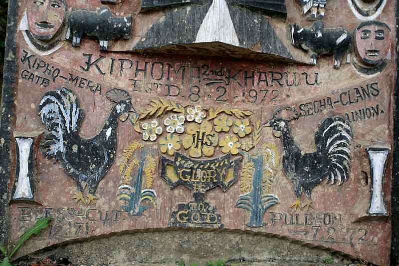 Lower part of same town gate with Christian symbols and words.