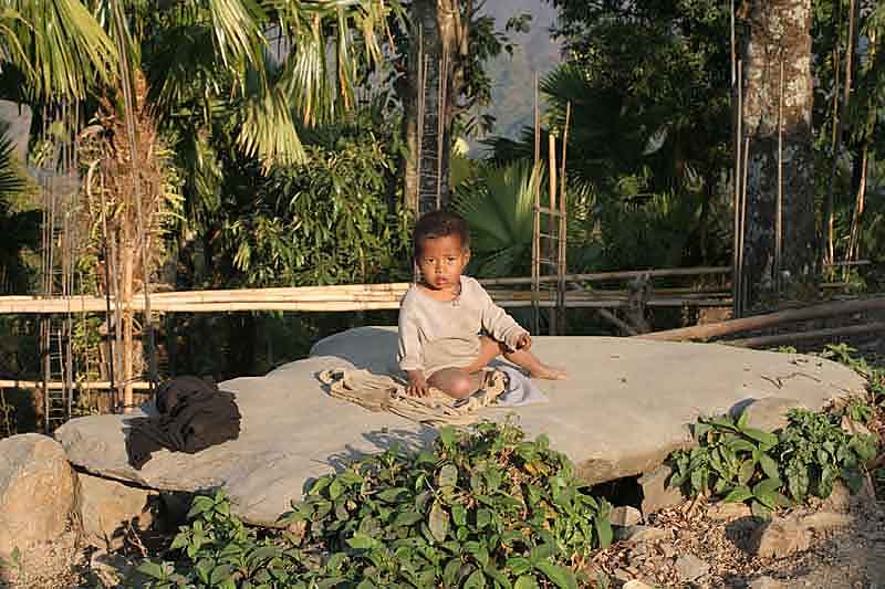 In Sheanghah Chingnyu (S/ Chingnyu) in front of the Anghs house. The child is sitting on a special stone; see next photo.