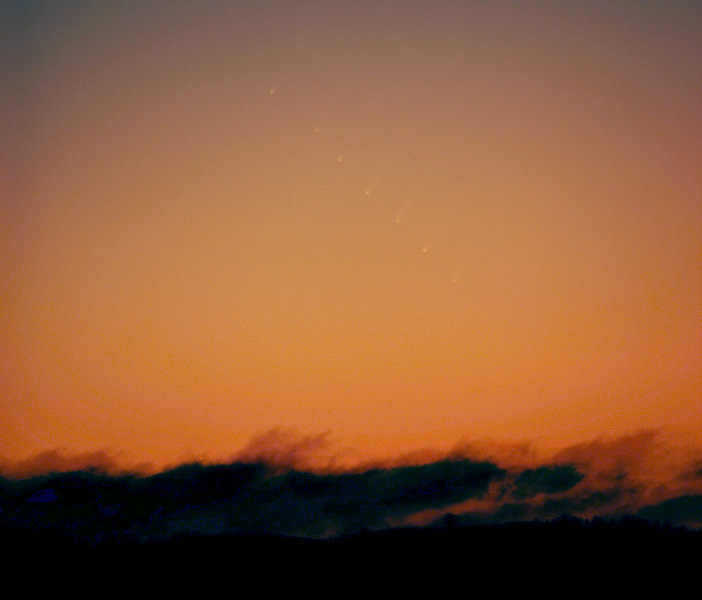 Comet McNaught following the sunset