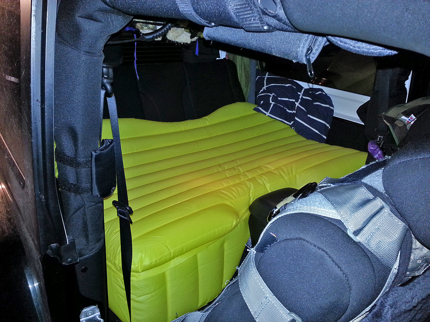 Inflatable car bed on backseat in a 2 door Jeep Wrangler Sahara