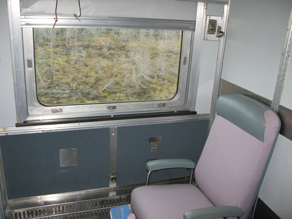 Train Cabin with bed folded away.