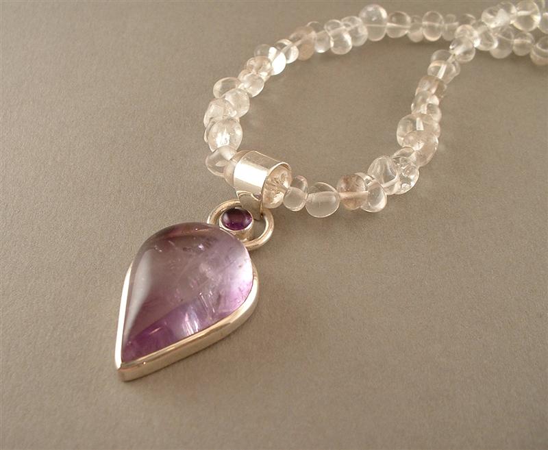 WN617 - Amethyst Pendent on Rock Crystal