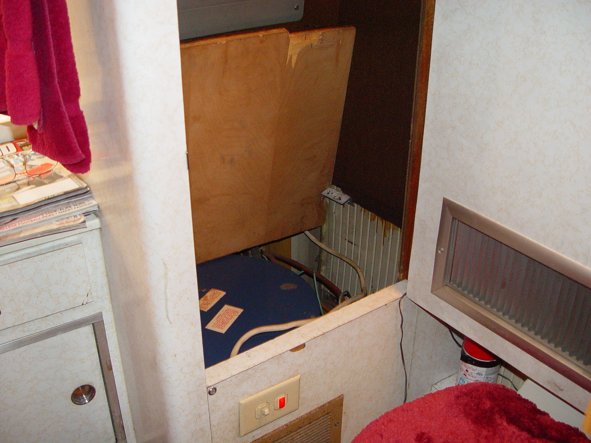 WATER HEATER IS LOCATED IN BOTTOM OF REAR BATHROOM CLOSET, DOOR OPENING IS 17 WIDE WITH DOOR ATTACHED