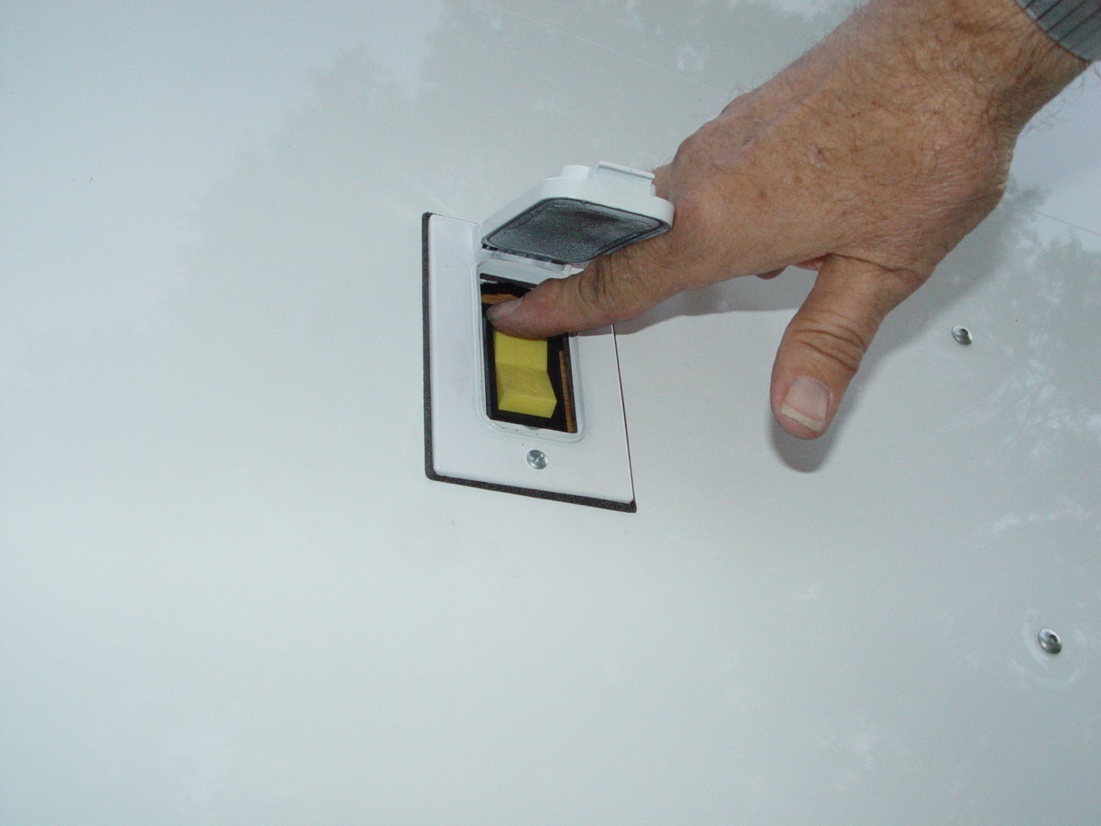 UNDER THE COVER IS THE SWITCH FOR THE 12 VOLT WINCH