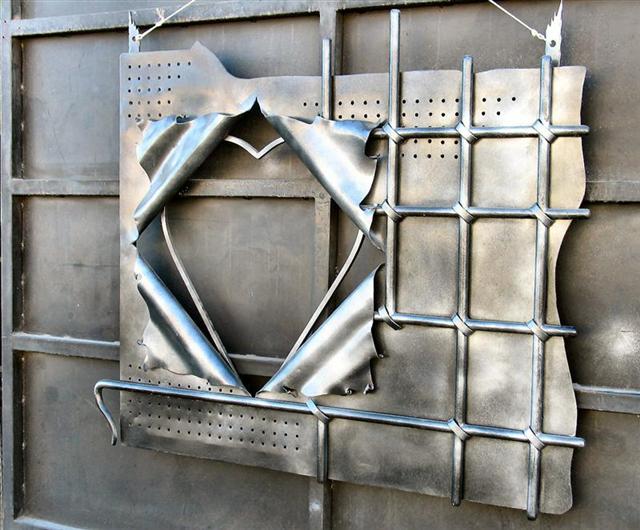 Modern Art On An Iron Gate At A Blacksmiths Yard (Golani Brigade St.).JPG