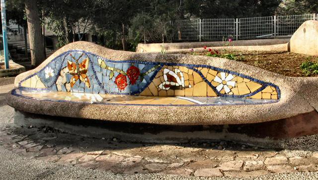 The Benches Here Are Covered With A Colored Mosaic  .JPG