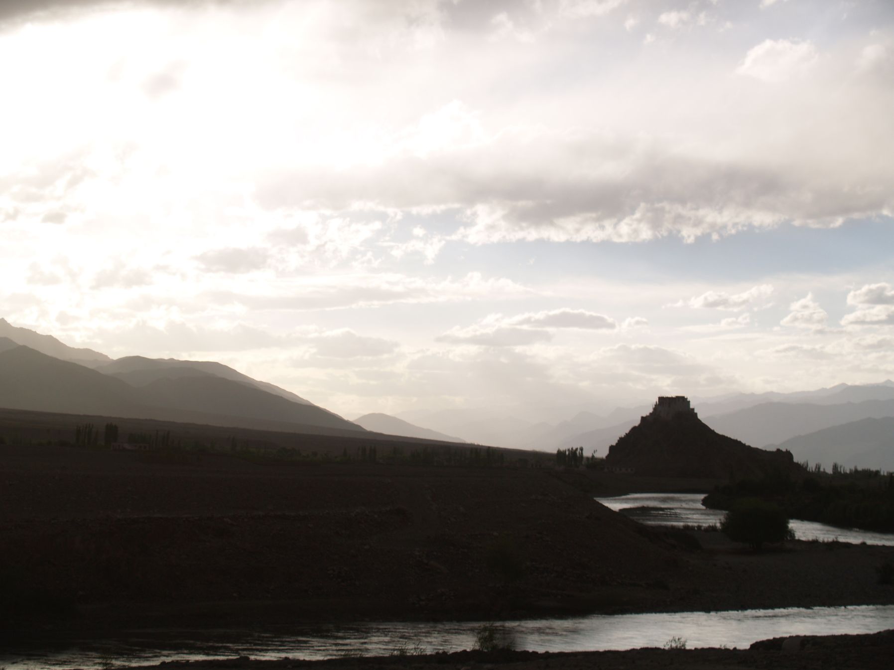 Approaching Leh, with Thiksey Monastery (gompa) silhouetted in the distance
