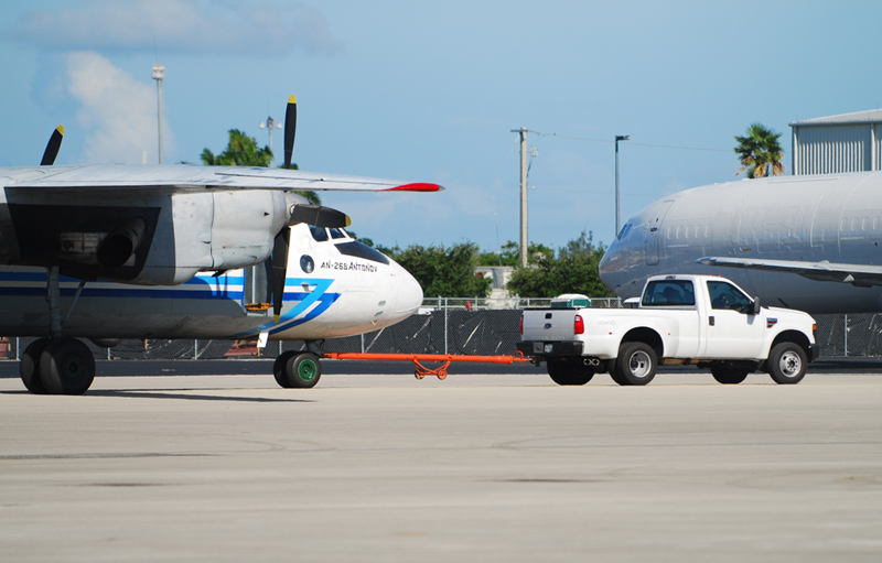 An-26 in tow behind Fodr pickup truck in Miami (!)