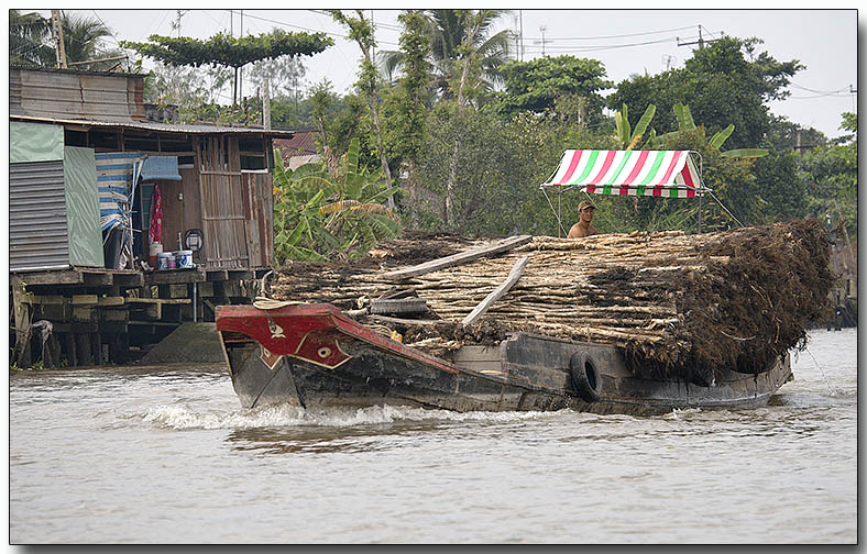 Lumber for river houses - Floating Market