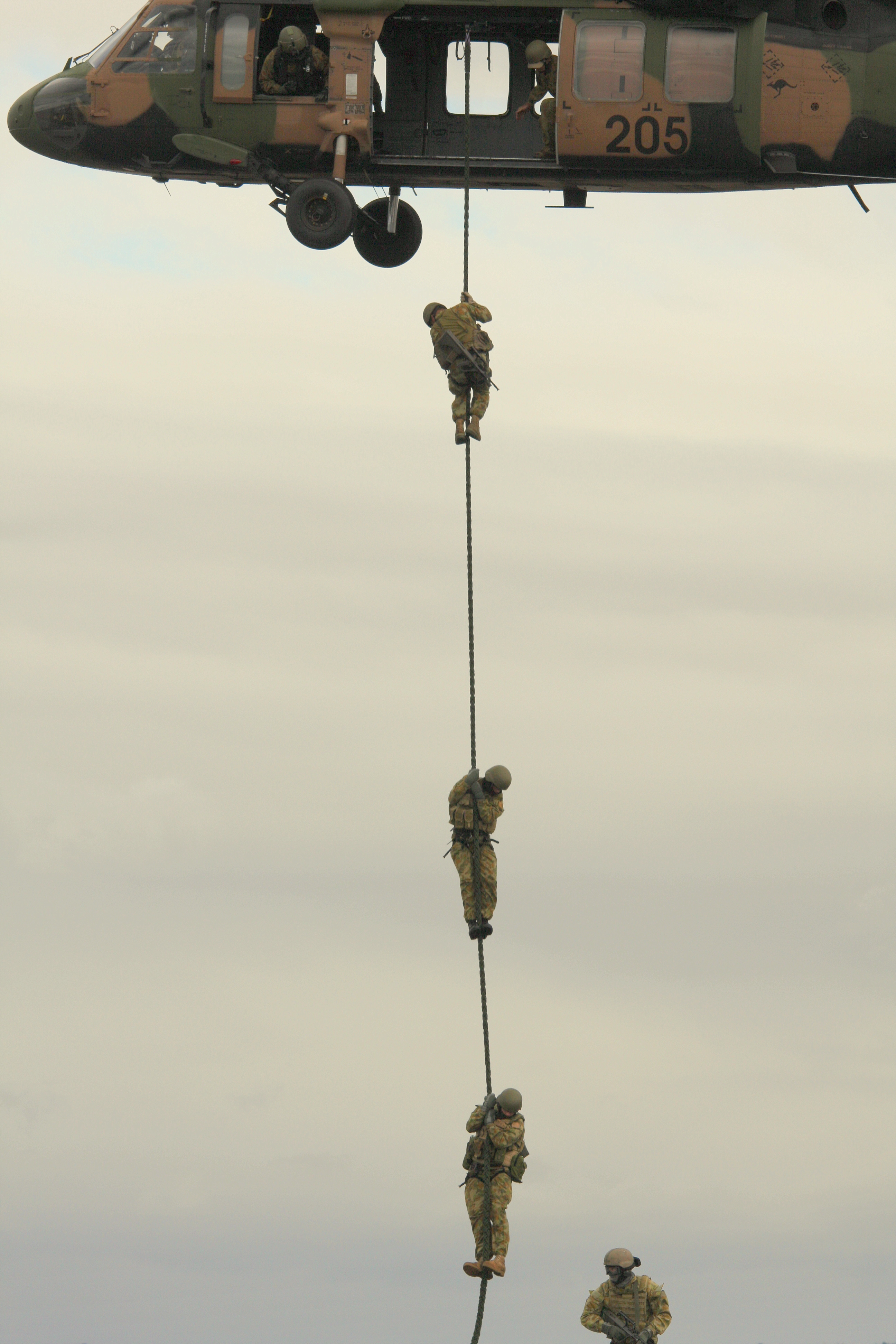 Soldiers leave Blackhawk.jpg