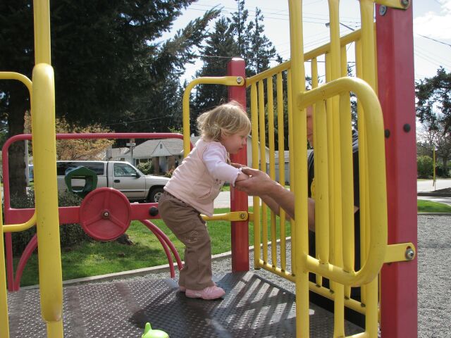 Dad helps me get to  the slide.