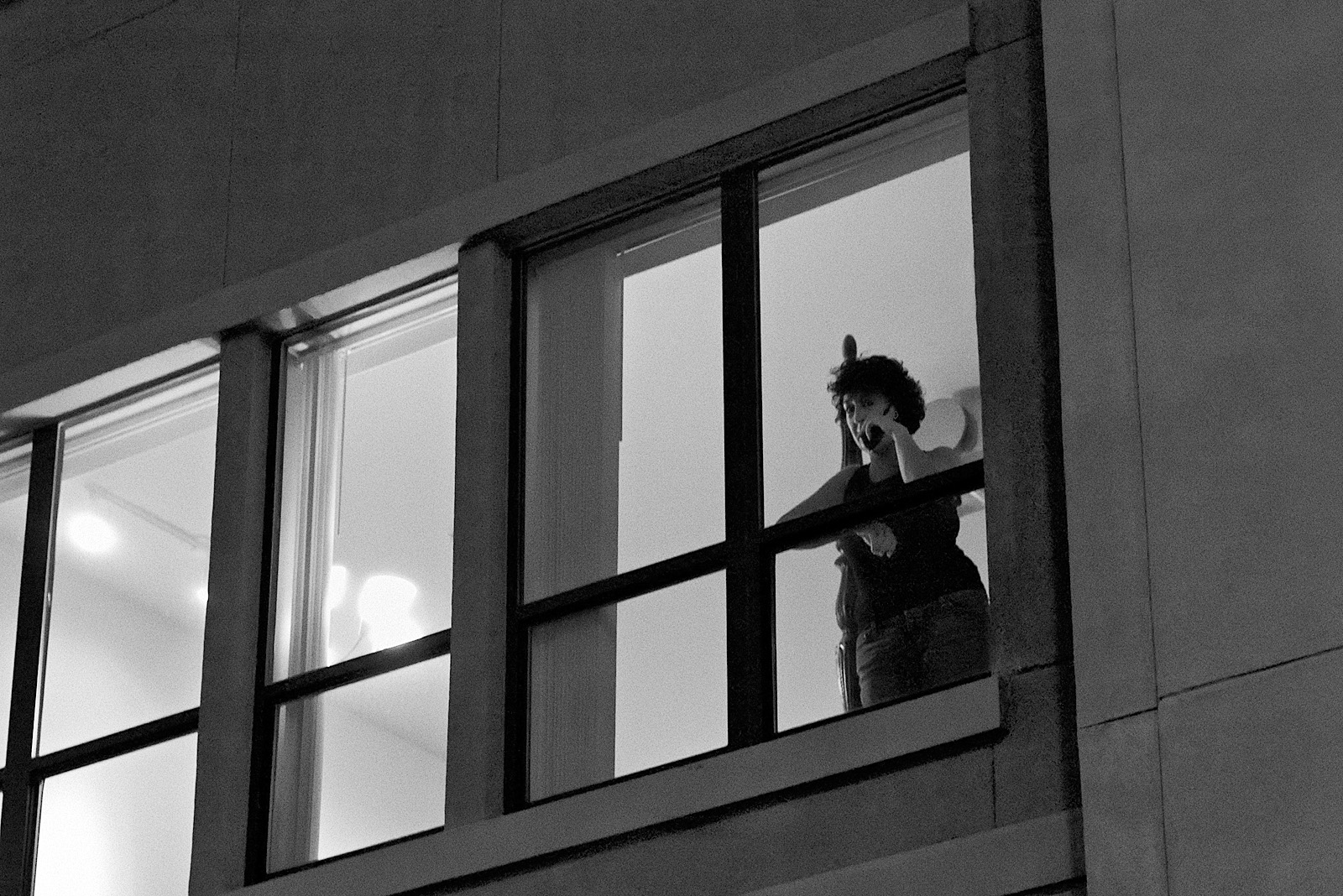 taking a call on Capitol St bw