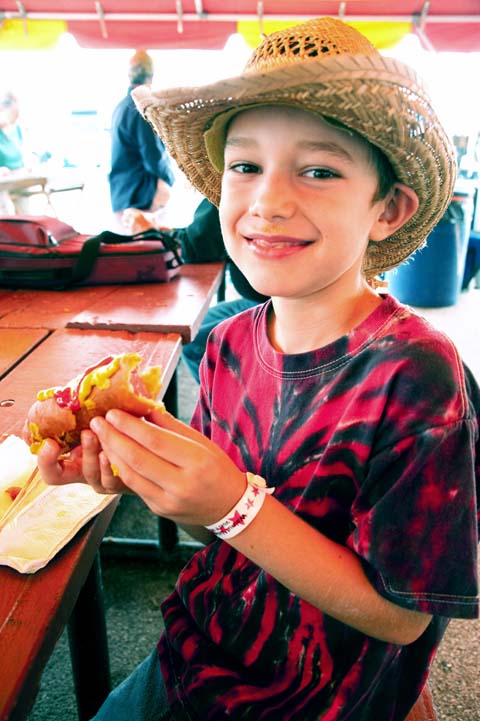 shirt matches his hot dog