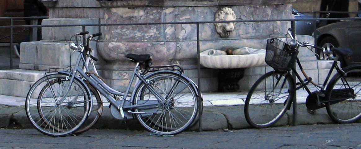 Pastel bicycles and fountain<br />7959