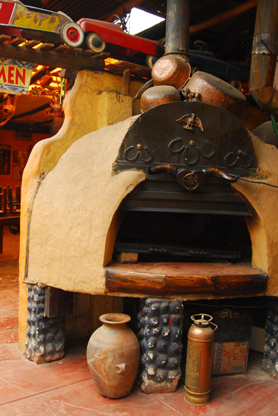 Wood-fired pizza over, La Cabaa, Huancayo